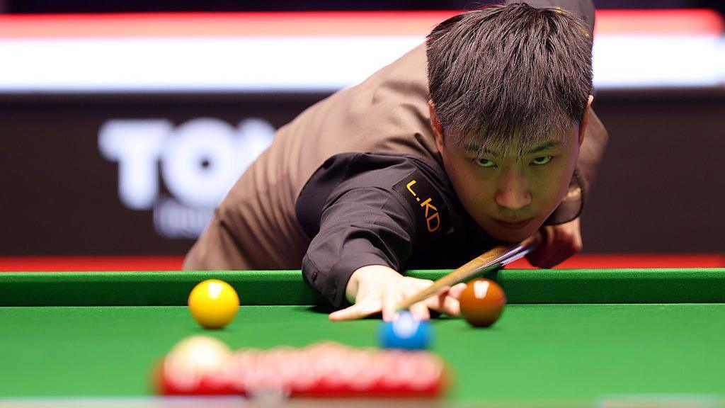 Zhao Xintong in action
