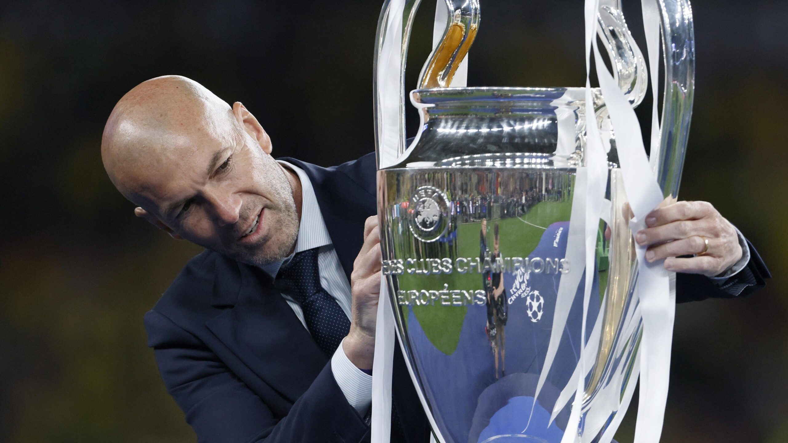 Zinedine Zidane with the Champions League trophy