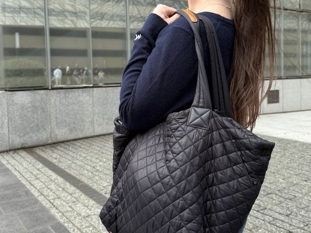 Editor holding quilted MZ Wallace tote