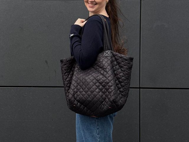 Editor holding quilted MZ Wallace tote