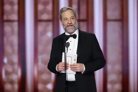 Getty Images Film-maker Judd Apatow presents onstage during the 83rd Golden Globe Awards.