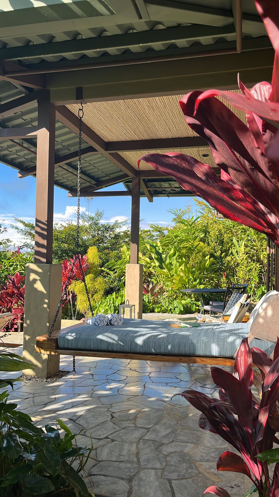 Image may contain Architecture Building House Housing Porch Indoors Interior Design Outdoors Shelter and Person