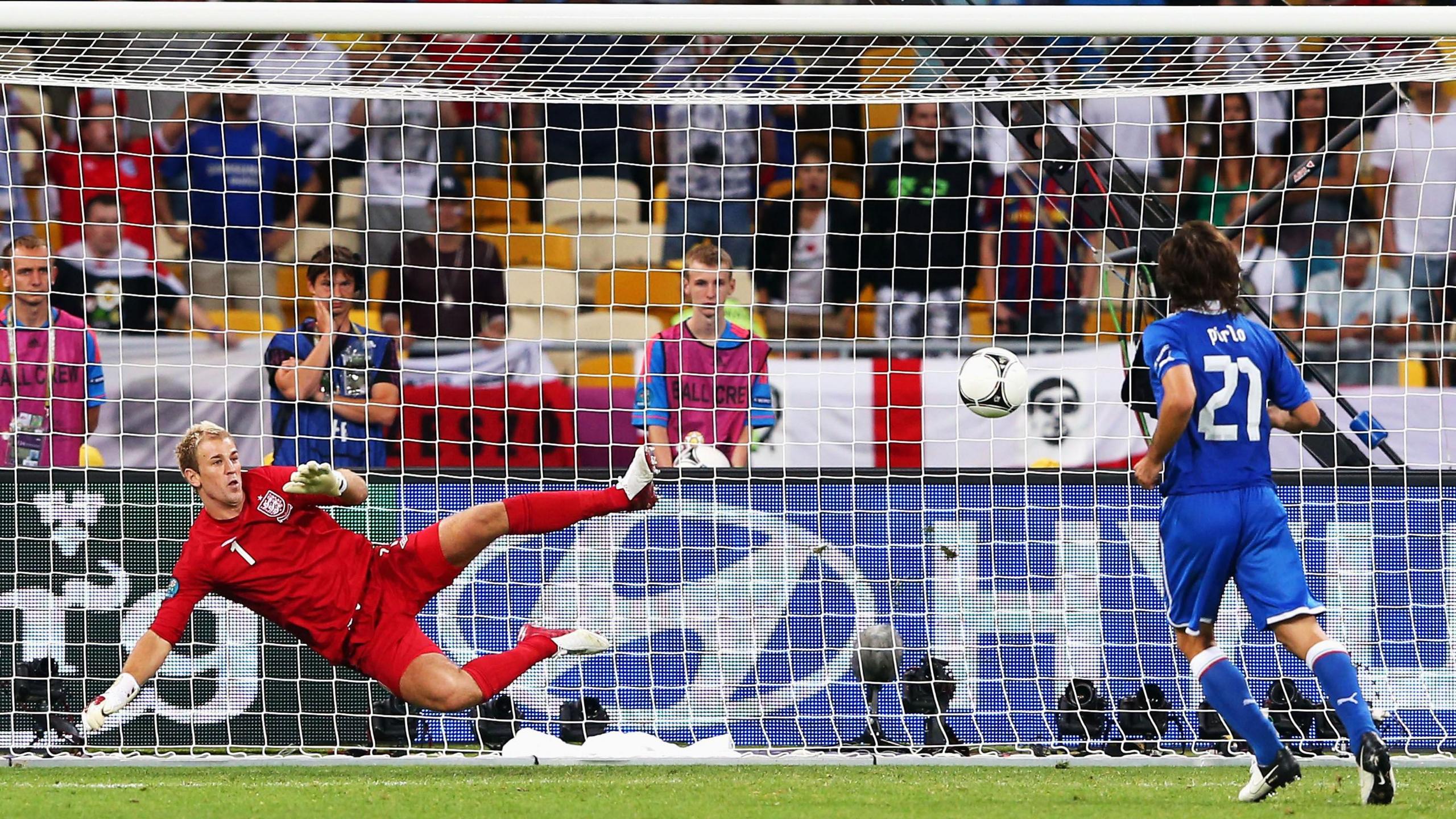 Italy's Andrea Pirlo dinks a penalty down the middle past England goalkeeper Joe Hart at Euro 2012