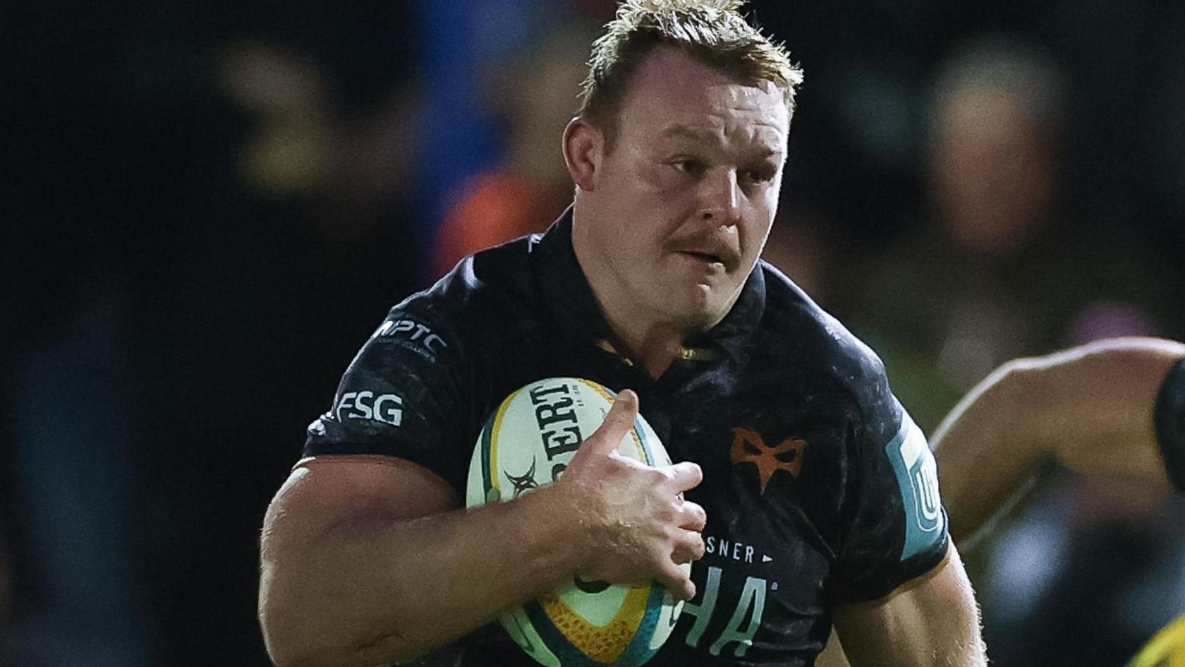 Dewi Lake in action with ball in hand for Ospreys