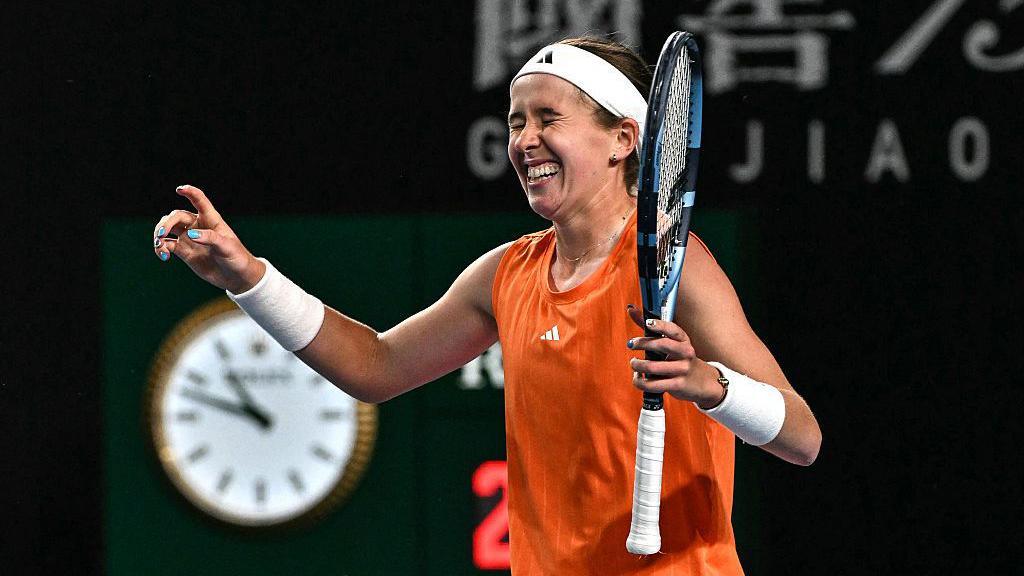 Nikola Bartunkova celebrates after winning against Switzerland's Belinda Bencic