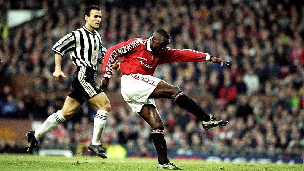 Andy Cole in action for Manchester United against Newcastle