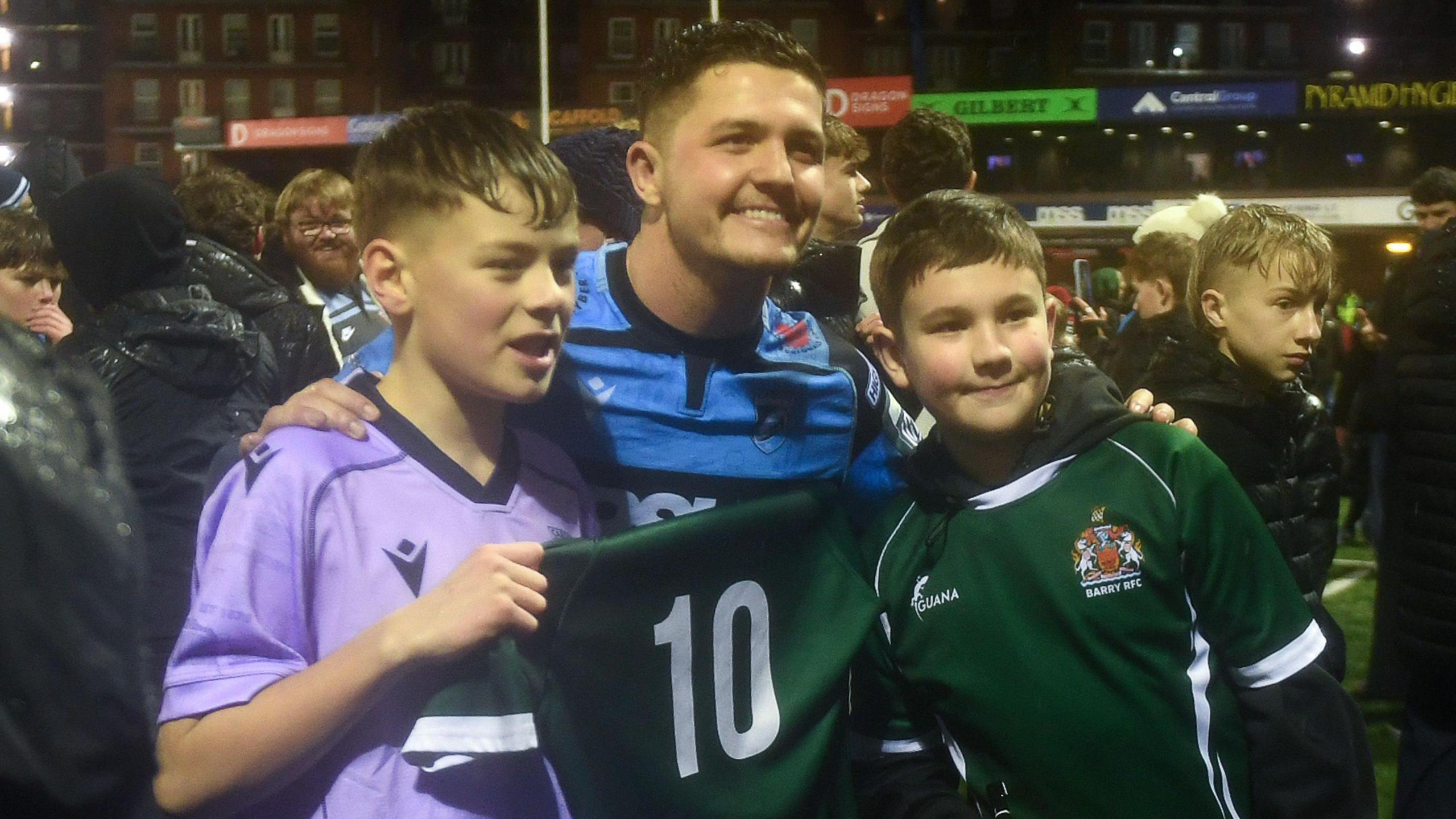 Callum Sheedy of Cardiff Rugby with fans at full time