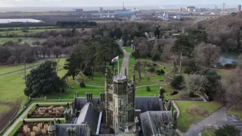 Swansea University An aerial photo with Margam Castle in the foreground and the Port Talbot steelworks in the distance