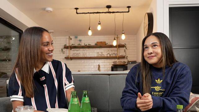 Alex Scott and Olivia Smith chatting on the sofa