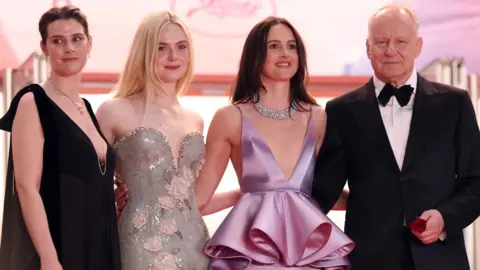 Getty Images Inga Ibsdotter Lilleaas, Elle Fanning, Renate Reinsve and Stellan Skarsg&aring;rd attend the "Affeksjonsverdi" (Sentimental Value) red carpet at the 78th annual Cannes Film Festival at Palais des Festivals on May 21, 2025 in Cannes, France.