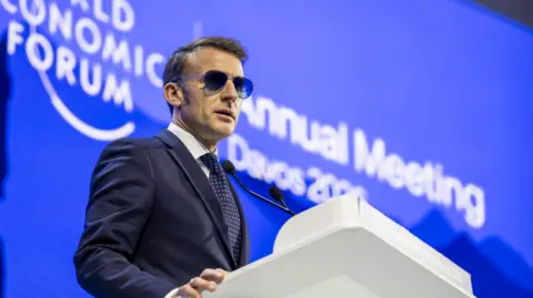 EPA/Shutterstock French President Emmanuel Macron speaks during a plenary session at the Congress Hall during the 56th annual meeting of the World Economic Forum (WEF) in Davos