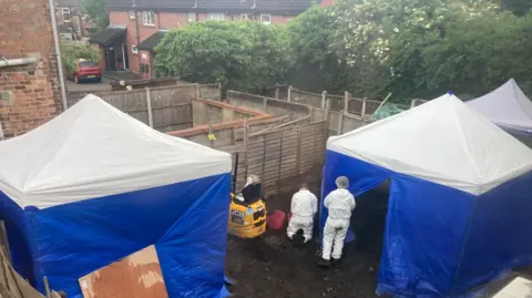 A crime scene in place in Princes Street where two tents have been erected