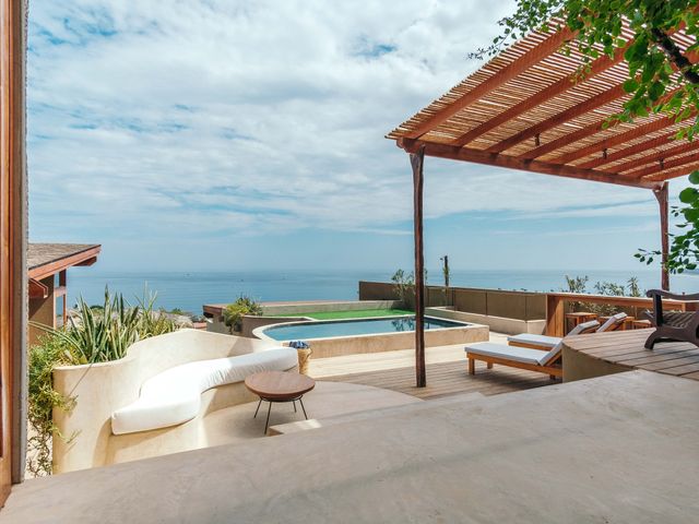 Image may contain: Pool, Water, Tub, Swimming Pool, Outdoors, Architecture, Building, House, Housing, Patio, and Indoors