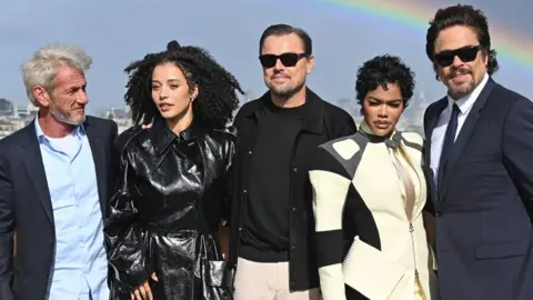 Getty Images Sean Penn, Chase Infiniti, Leonardo DiCaprio, Teyana Taylor and Benicio del Toro attend the London Photocall for "One Battle After Another" on September 15, 2025 in London, England.