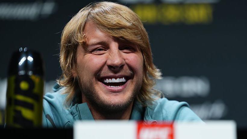 Paddy Pimblett laughs at a news conference