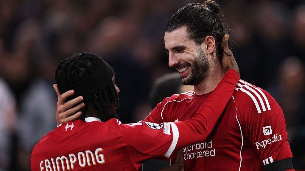 Dominik Szoboszlai and Jeremie Frimpong celebrate during Liverpool's win at Marseille