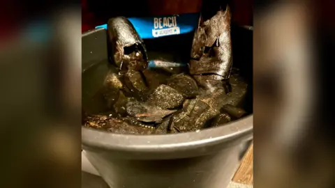 What happened to the 200 Victorian shoes that washed up on a beach?