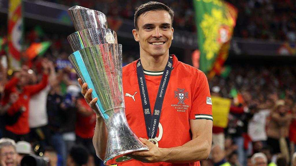 Joao Palhinha with the Nations League trophy