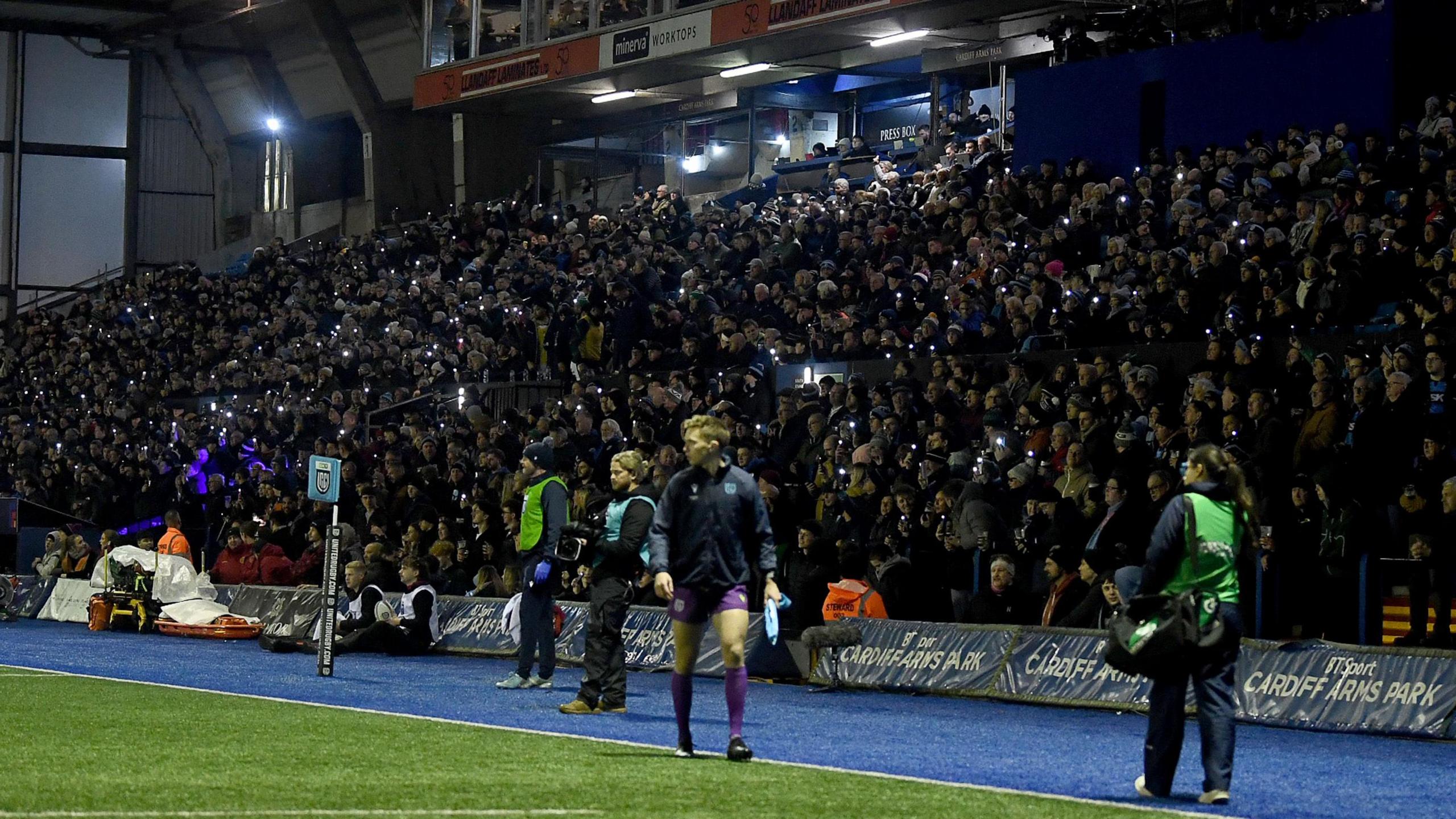 Cardiff fans shine their phone lights in protest in the 11th minute of the 17-8 win against Lions, due to the potential changes to Welsh rugby