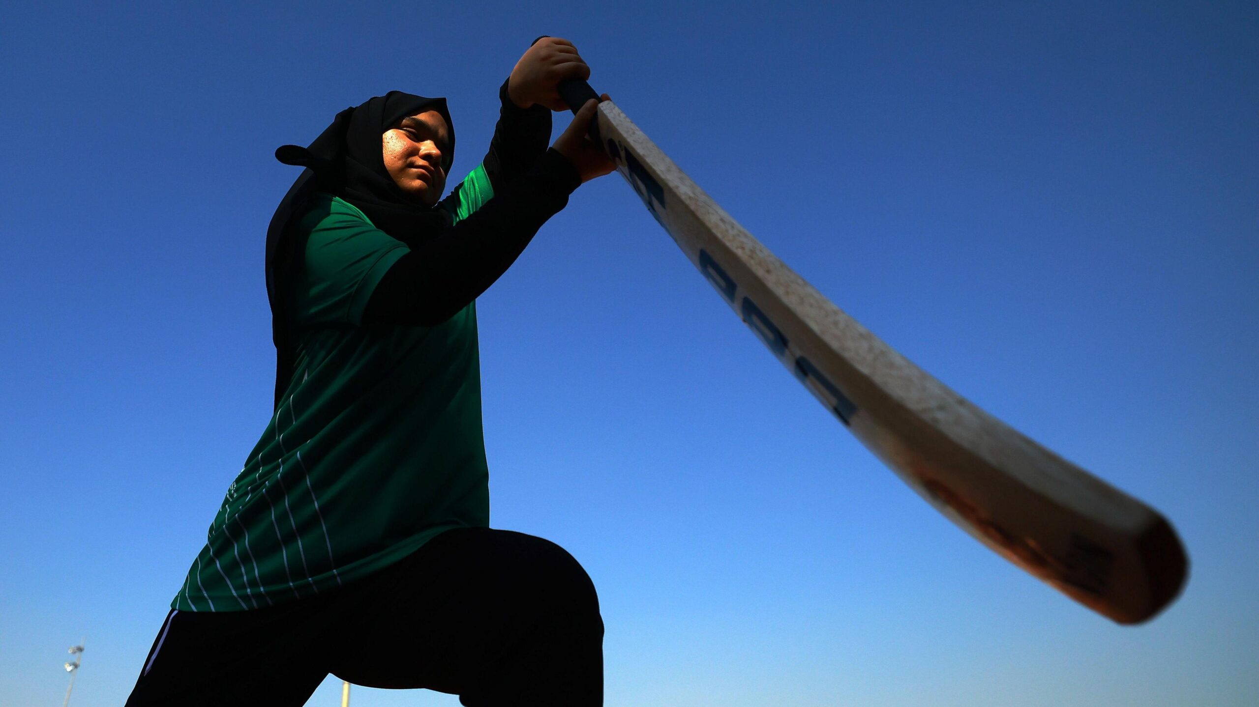 Saudi Arabia women's cricketer Momeena Ahmad plays a forward defensive shot