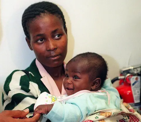 ‘Miracle baby’ born in a tree above Mozambique floodwaters dies aged 25