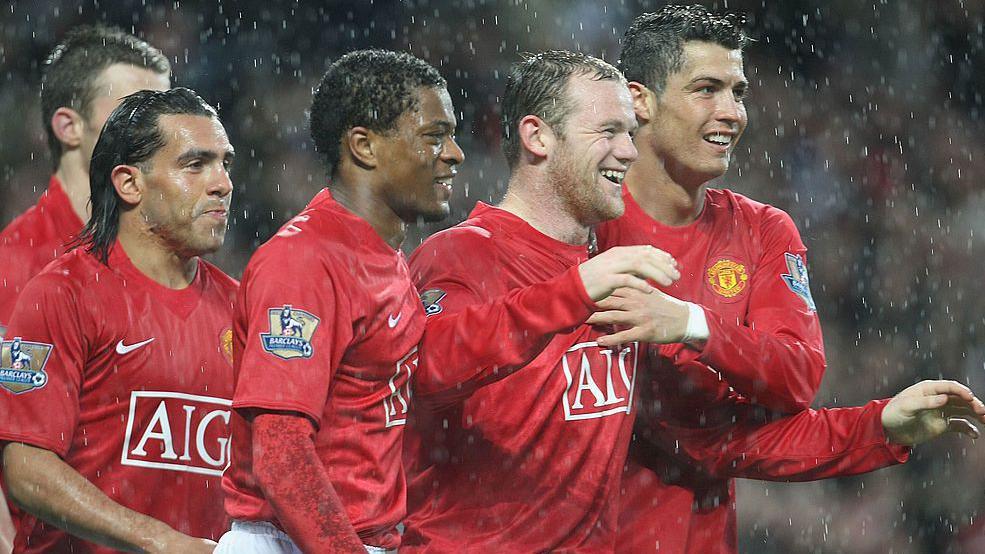 Manchester United players Carlos Tevez, Patrice Evra, Wayne Rooney and Cristiano Ronaldo celebrate a goal