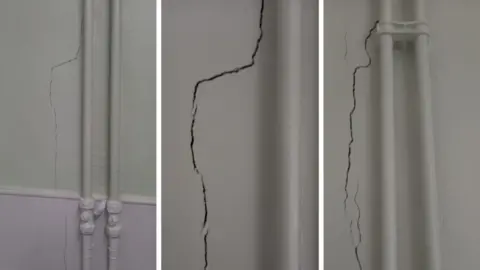 GLORIA FLACK A composite of three pictures showing cracks on a wall. On the left is an image taken from 2024, showing a crack running alongside some water pipes. The central image show what looks like the same crack in 2025, which appears to be slightly wider. The image on the right shows another section of cracked wall.