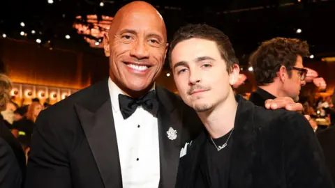 Getty Images Dwayne Johnson and Timoth&eacute;e Chalamet attend the 83rd Annual Golden Globe Awards at The Beverly Hilton on January 11, 2026 in Beverly Hills, California.