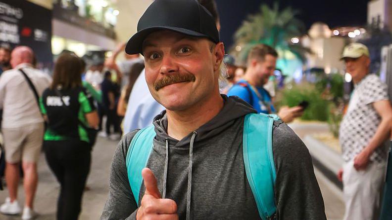Valtteri Bottas giving the thumbs-up signal in the paddock at the 2025 Abu Dhabi Grand Prix