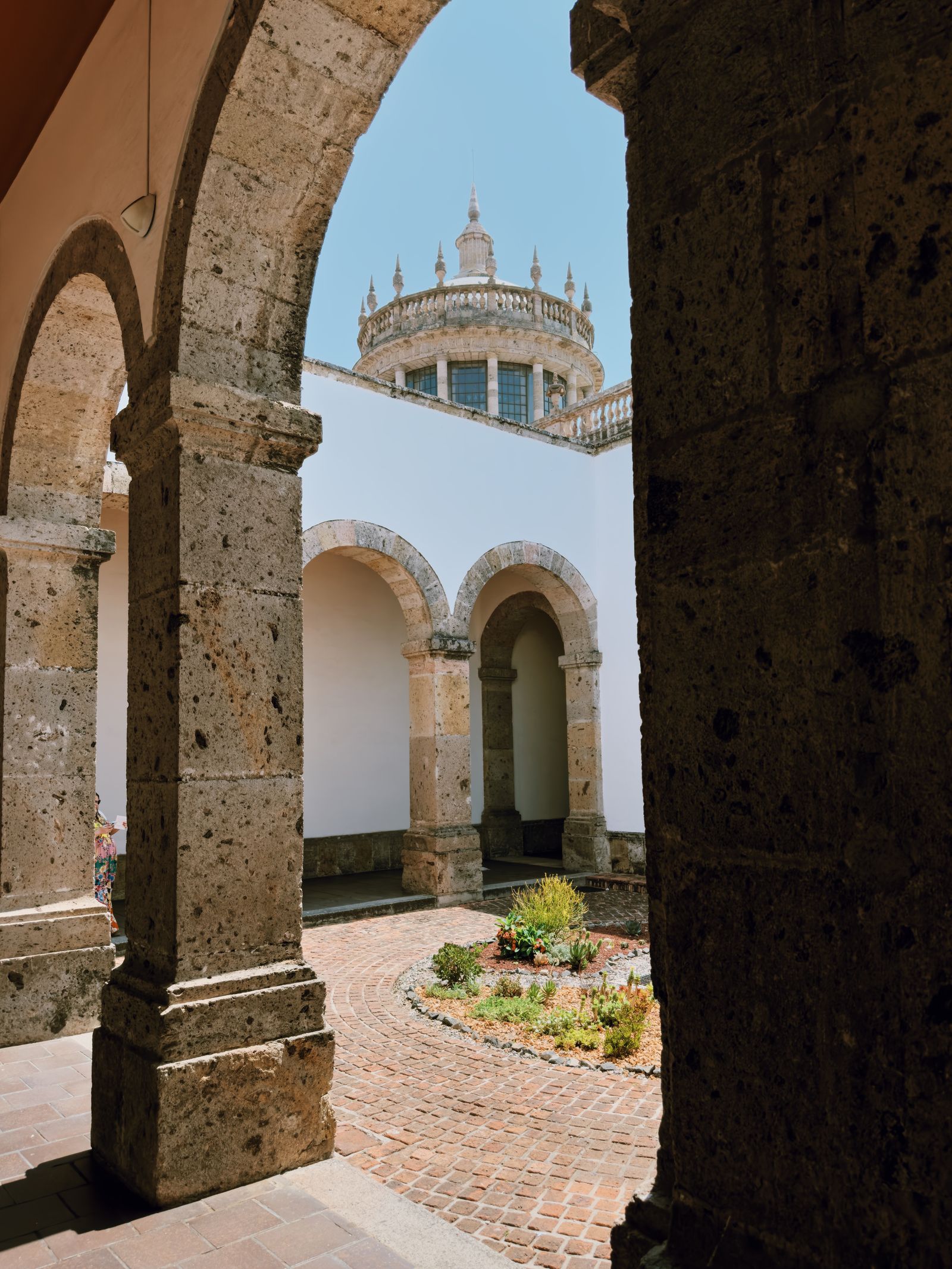 Image may contain Arch Architecture Building House Housing Villa Monastery Gothic Arch and Hacienda