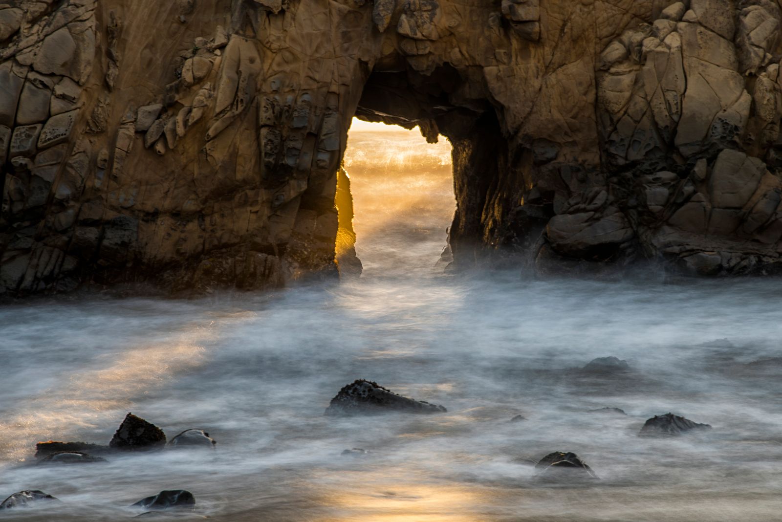 Image may contain Cave Nature Outdoors Coast Cove Sea Shoreline Water Scenery and Rock