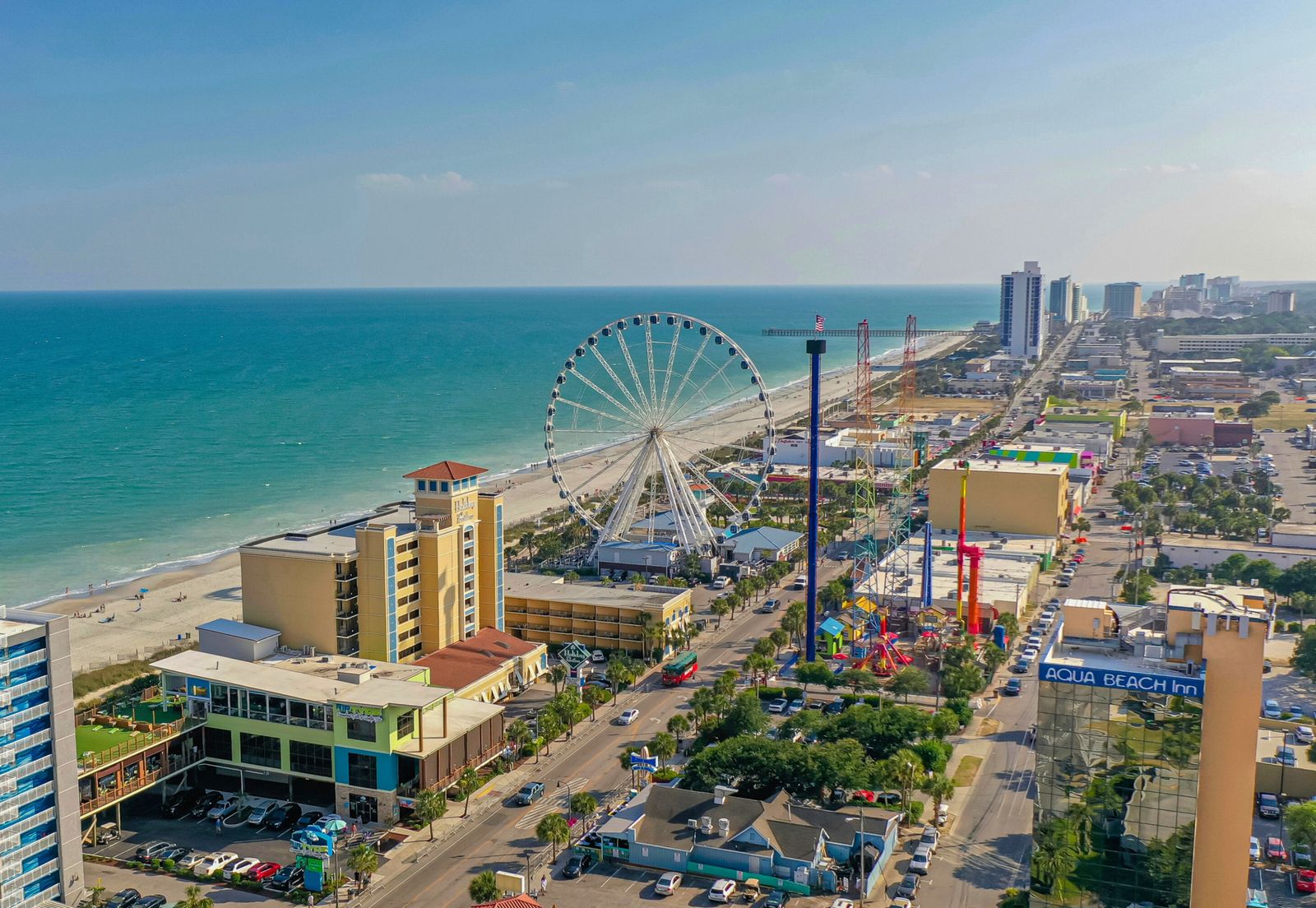 Image may contain Architecture Building Cityscape Urban Machine Wheel Amusement Park Fun Theme Park and Outdoors