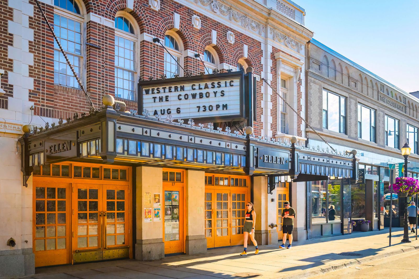 Image may contain Zhang Zhongqi Urban Cinema City Road Street Architecture Building Person Clothing and Shorts