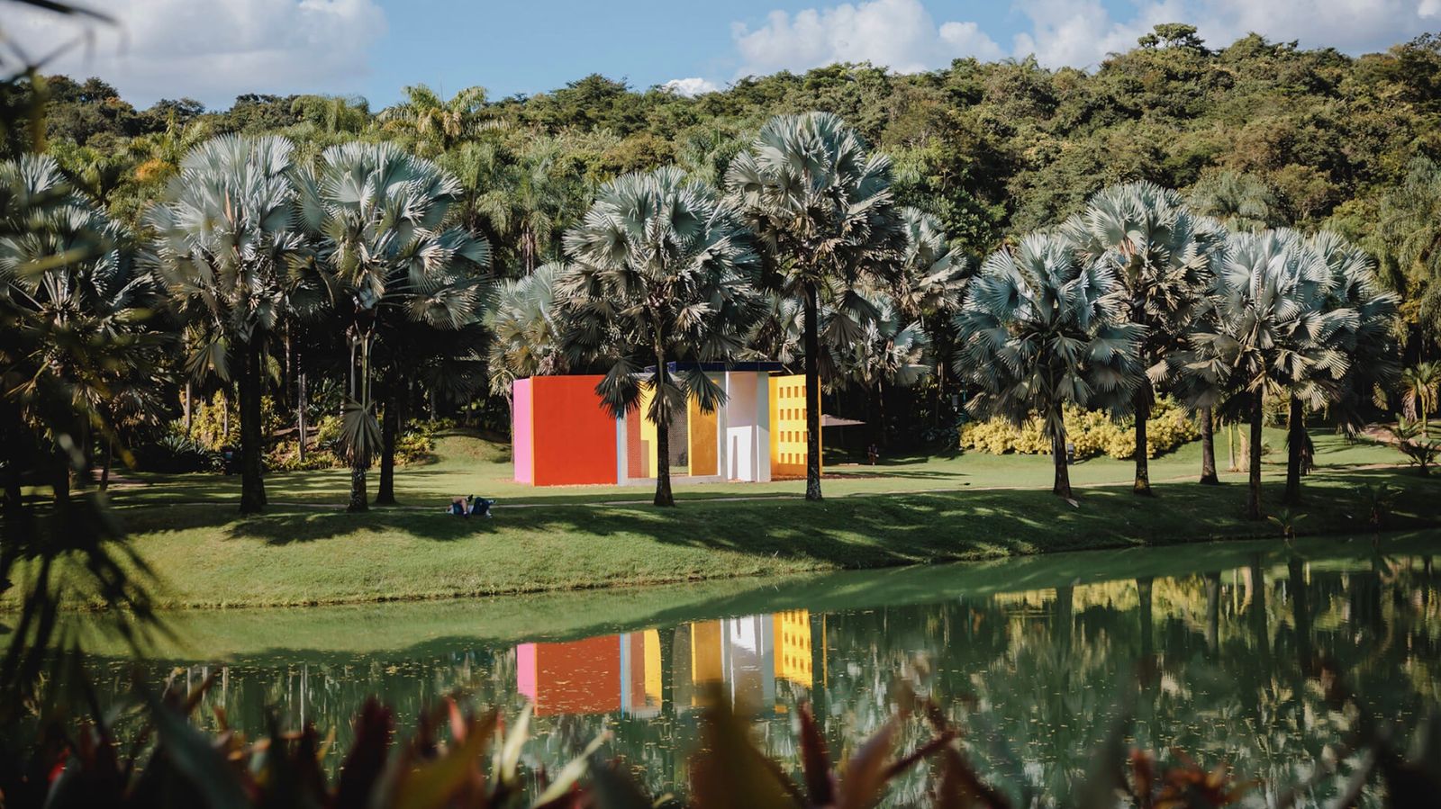 Image may contain Architecture Building Hotel Resort House Housing Villa Grass Plant Outdoors Nature and Person