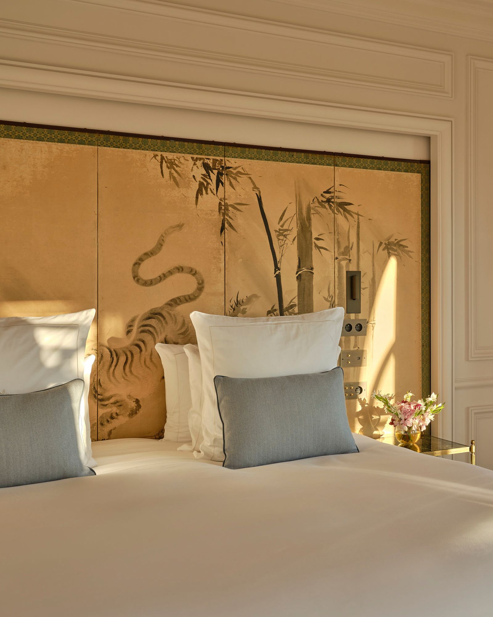 Image may contain Cushion Home Decor Pillow Indoors Interior Design Animal Reptile Snake Bed and Furniture