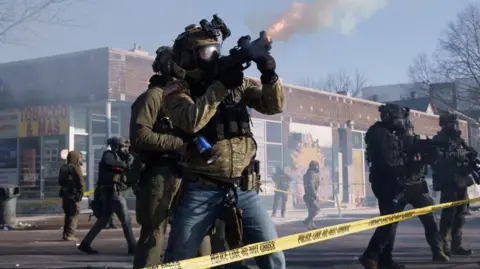 Reuters Federal agents clash with protesters in Minneapolis