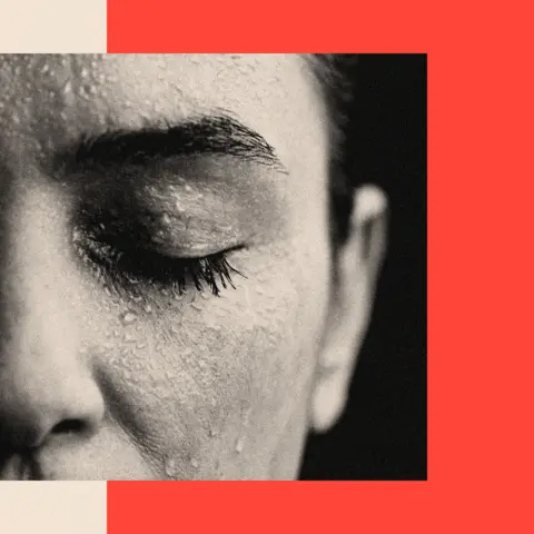 BBC A closeup of a woman's sweating face