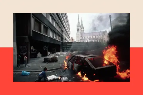 VCG via Getty Images A car burning on fire