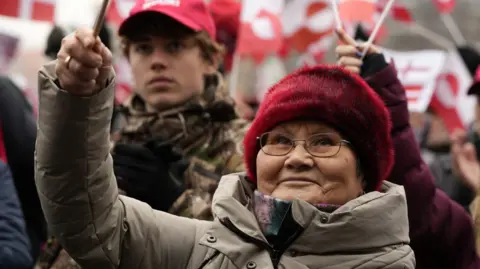 EPA/Shutterstock People take part in a protest under the slogans 'Hands off Greenland' and 'Greenland for Greenlanders' in Copenhagen, Denmark, 17 January 2026.