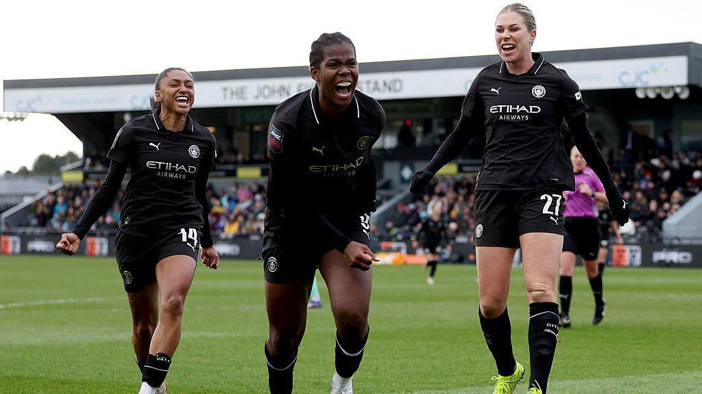 Manchester City players celebrate victory against London City Lionesses