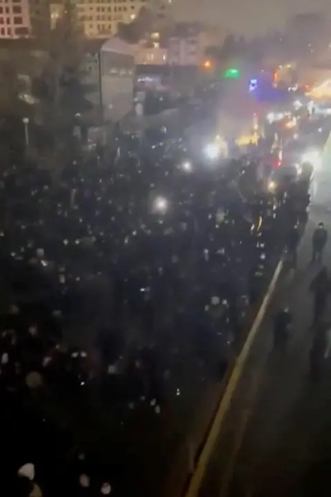 SOCIAL MEDIA via REUTERS Screengrab of undated video showing protesters in Tehran, Iran, posted on 9 January 2026