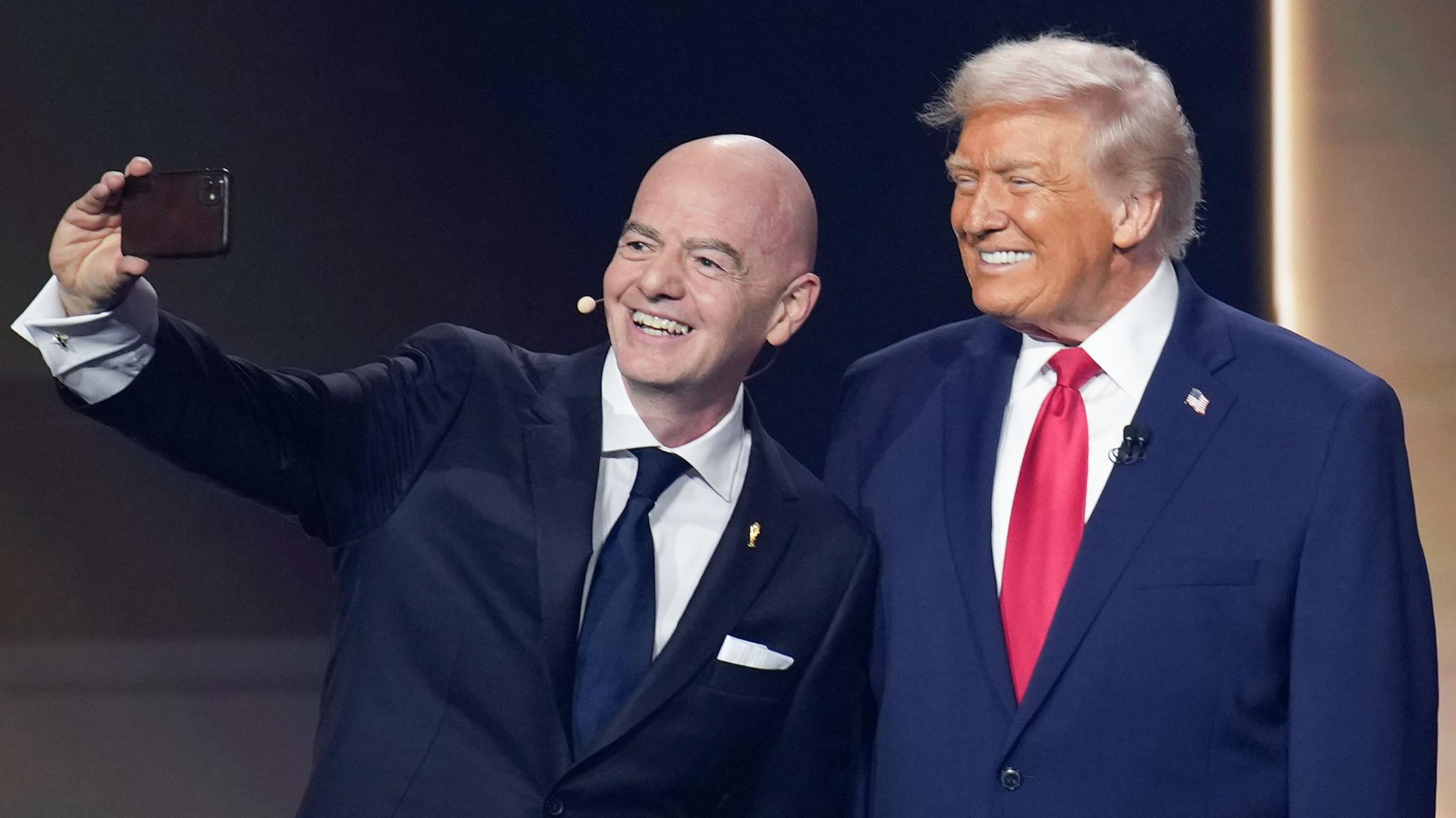 Fifa President Gianni Infantino takes a selfie with US President Donald Trump during the Fifa World Cup 2026 official draw