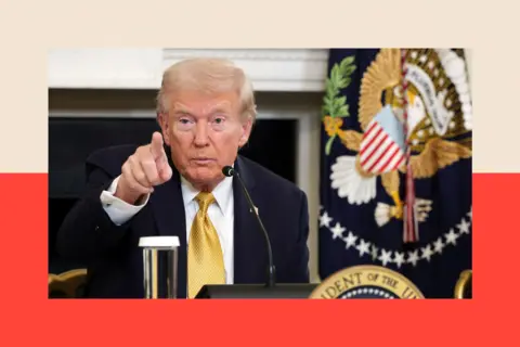 Getty Images President Donald Trump points as he takes a question from a reporter