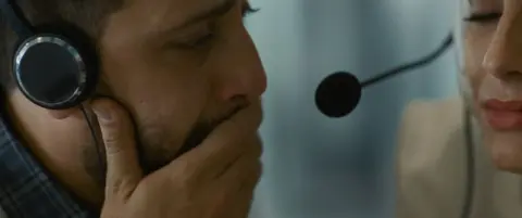 Willa Motz Malhees and Saja Kilani portraying helpers on the phone to young Hind Rajab while she is under attack