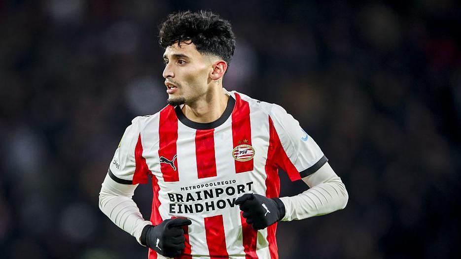 Ricardo Pepi PSV striker looking across the pitch with clenched fists