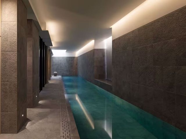 Image may contain: Pool, Water, Swimming Pool, Outdoors, Floor, and Aerial View