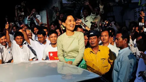From behind bars, Aung San Suu Kyi casts a long shadow over Myanmar
