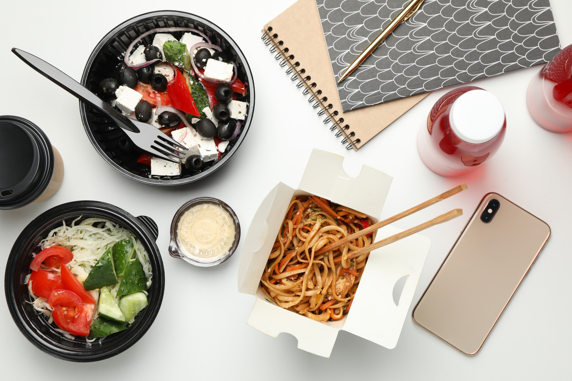 Food delivery. Takeaway food on white background