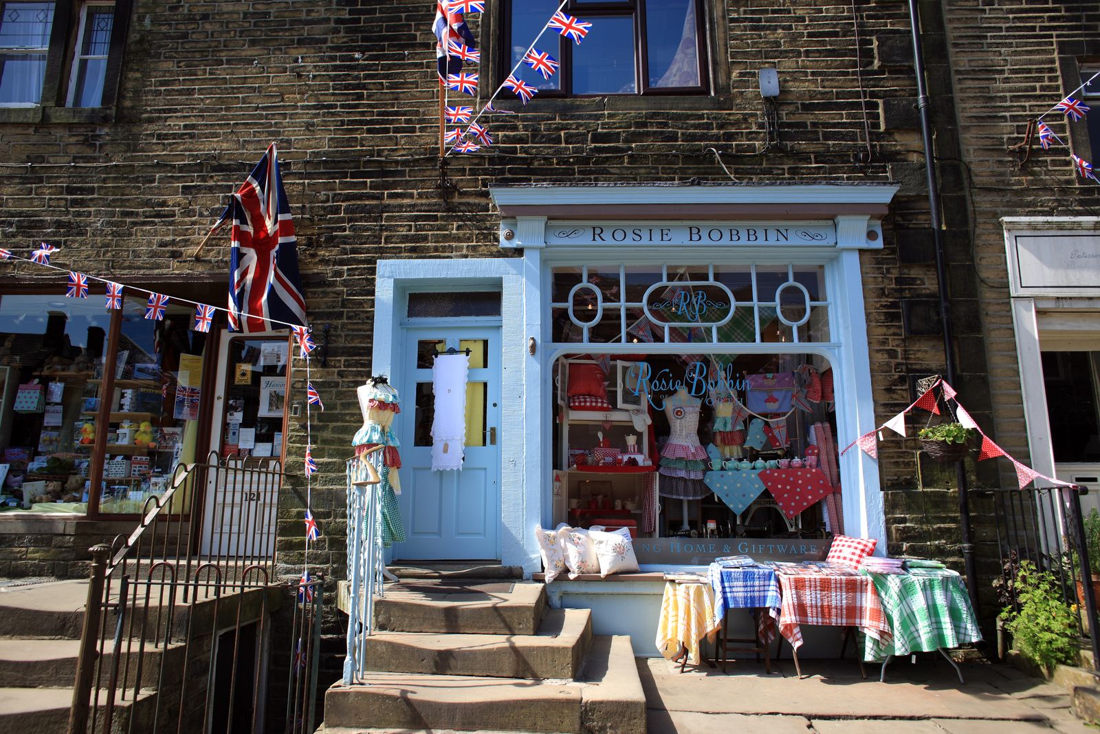 Image may contain Architecture Building Adult Person Home Decor Shop and City