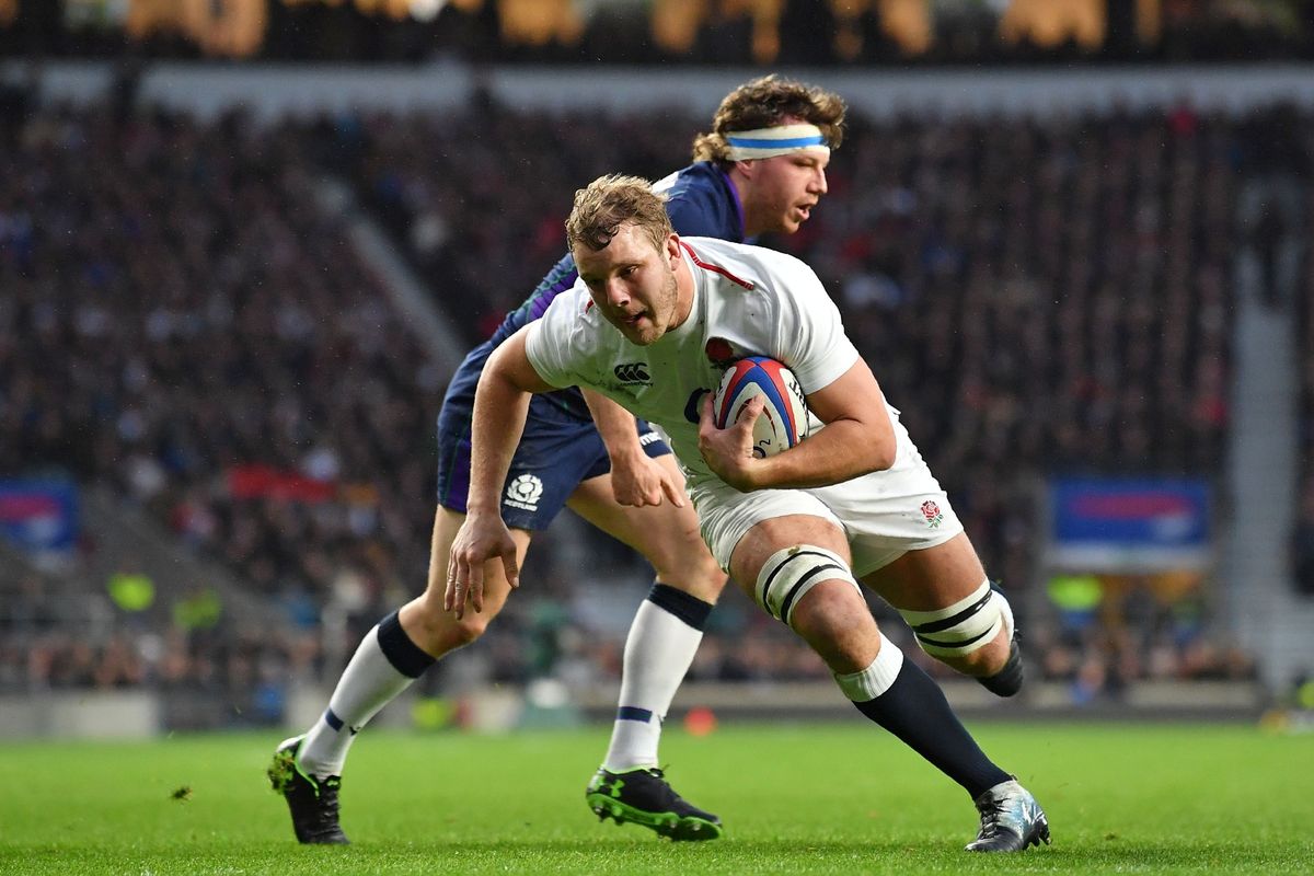 England's lock Joe Launchbury dives over the line to score their third try during the Six Nations international rugby union match between England and Scotland at the Twickenham, west London, on March 16, 2019.